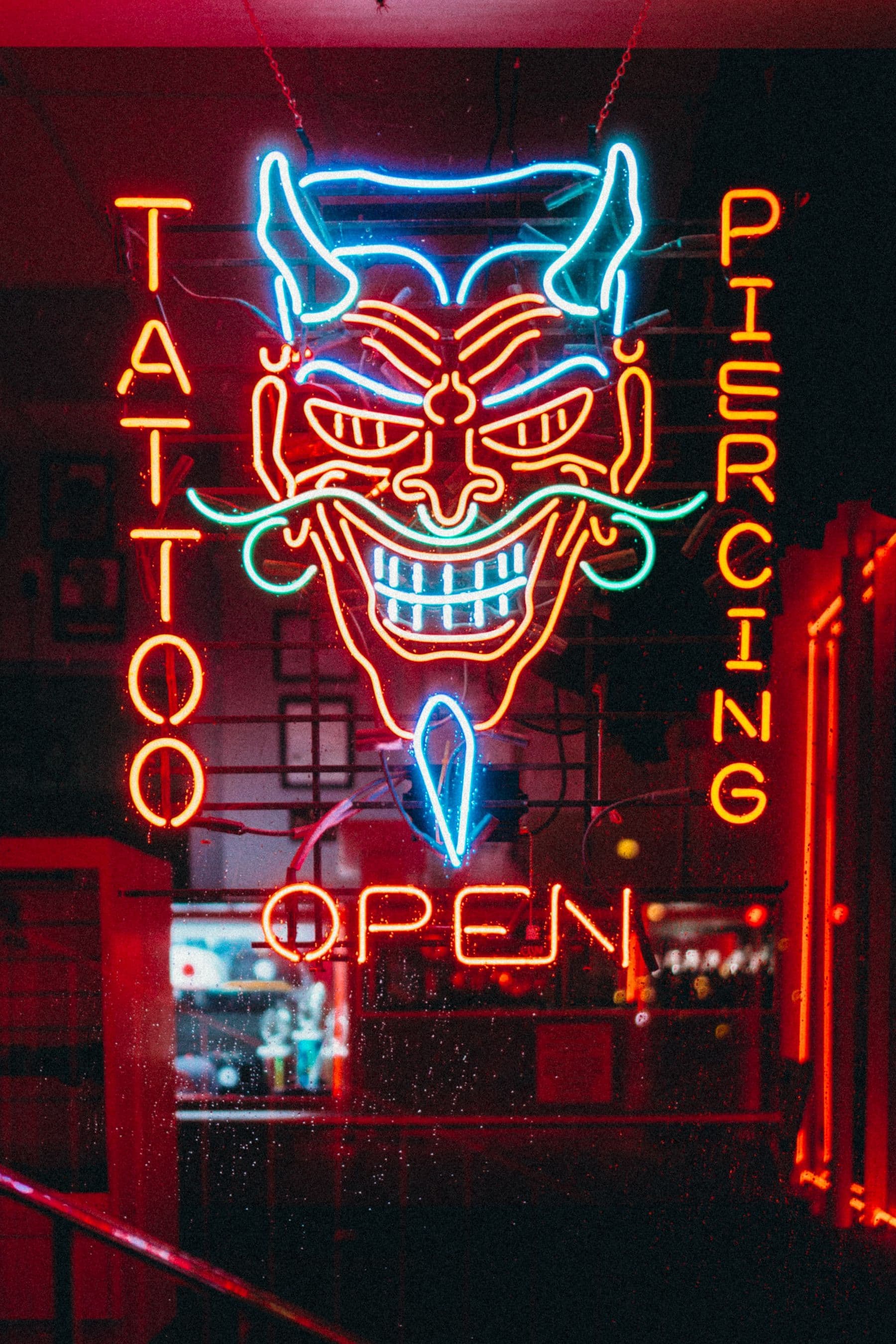 Neon sign glowing in the studio window